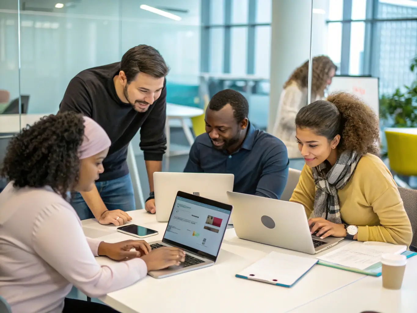 A diverse team of IT professionals collaborating in a modern office environment, showcasing Lituplabs' commitment to diversity and inclusion.